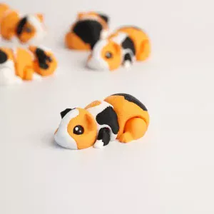 Jouet anti-stress articulé cochon d'inde